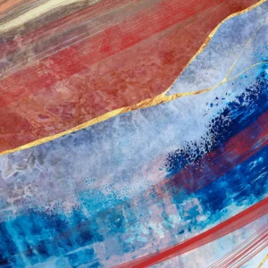 A vibrant abstract with motion and movement, featuring dynamic tones of red and blue, accented with touches of gold.