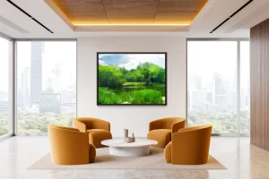 Lush riverside landscape with vibrant greenery, calm water, and soft sunlight.