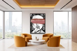 A monochrome portrait sketch contrasted by brushstrokes in vivid red hues.