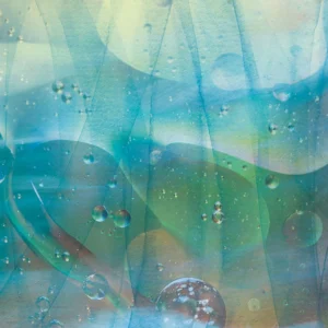 A textured overlay of soft hues of blue and green with layers of movement and dew drops.