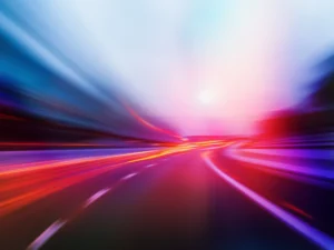 A dynamic fusion of photography and abstraction, where vivid light trails convey a sense of motion and energy.