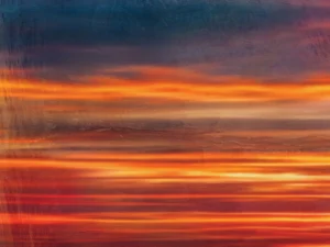 Radiant bands of orange, gold, and deep blue evoke the glow and motion of a dramatic sunset horizon.