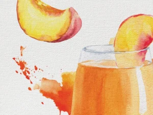 A light and luscious Peach Bellini, glowing with golden peachy hues.