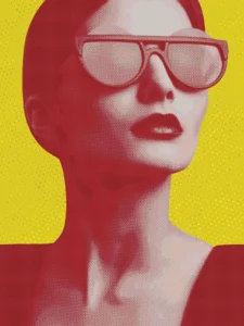 Bold portrait of a woman in sunglasses set against a vivid yellow background.