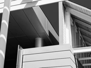 Modern architecture captured in black and white, emphasizing geometry, light, and shadow.
