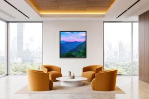 Sunset over layered forested hills with glowing sky and silhouetted trees.