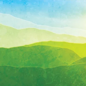 Soft layered greens lead to a rising sun beneath a clear sky.