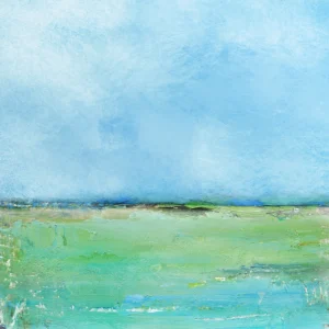 Expansive sky meets textured green fields, radiating peaceful openness and serenity.