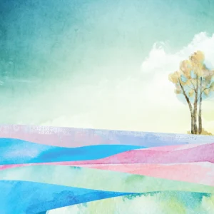 Lone tree stands gracefully above colorful rolling fields beneath glowing sky.