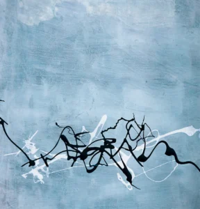 Inky black and white strokes ripple across an icy blue field, evoking the movement of wind skimming over frozen water.