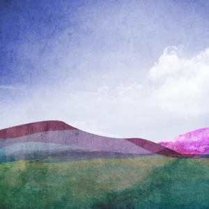 Dark grasslands lead into purple rolling hills that sit under a blue cloudy sky.
