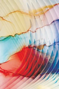 Resonant textures expand in perpetual cascading waves with bright red, blue and yellow exposure.