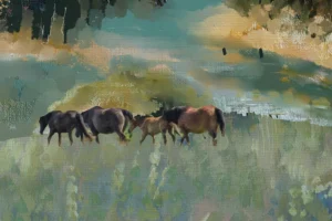 A wild herd grazes on the hill in a hazy afternoon.