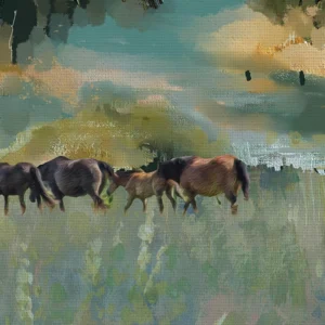 A wild herd grazes on the hill in a hazy afternoon.