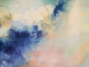 Cooling clouds of blue cut through the rising, heated light.