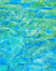 Crystalline waters shimmer in blue, green and teal.
